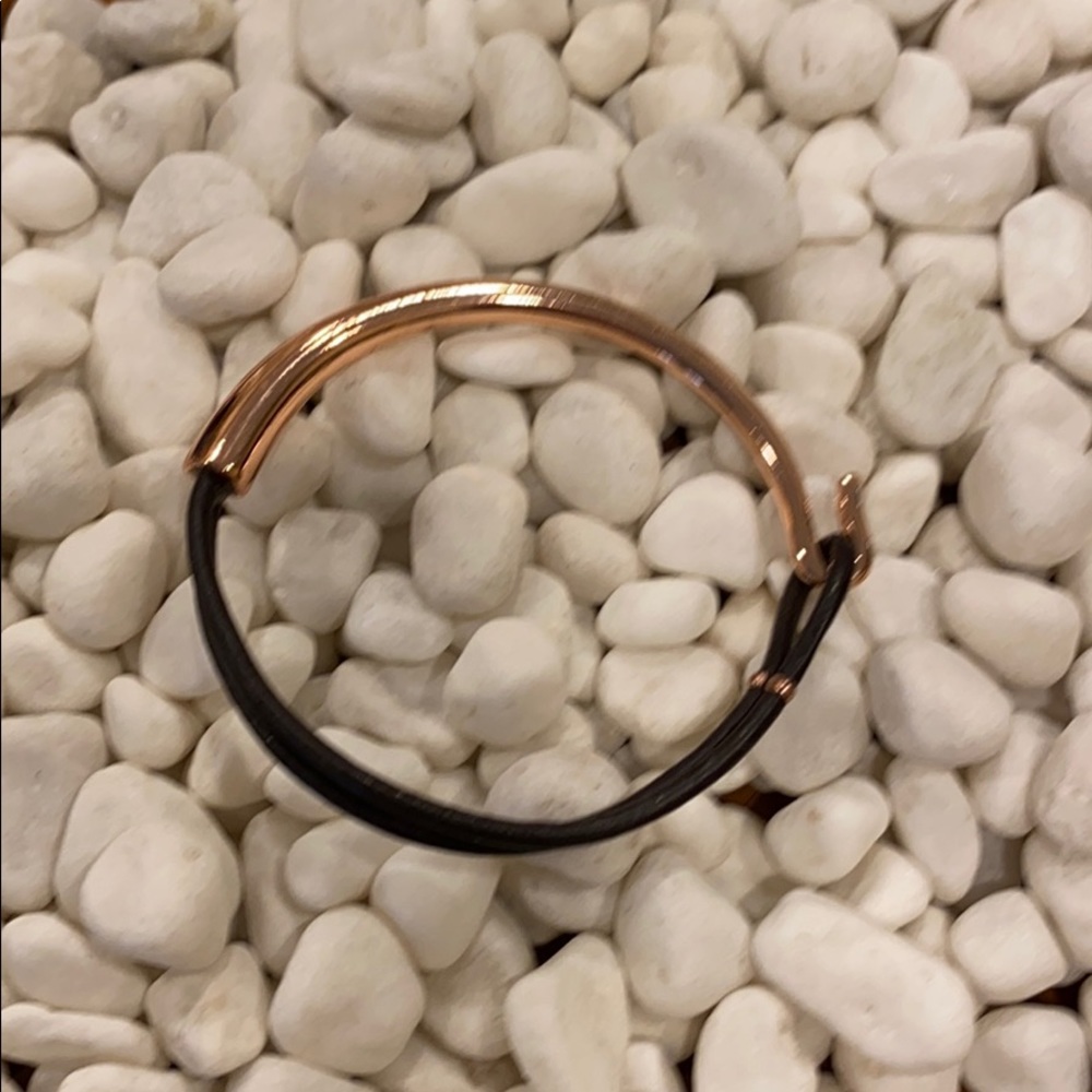 Leather and copper tone bracelet